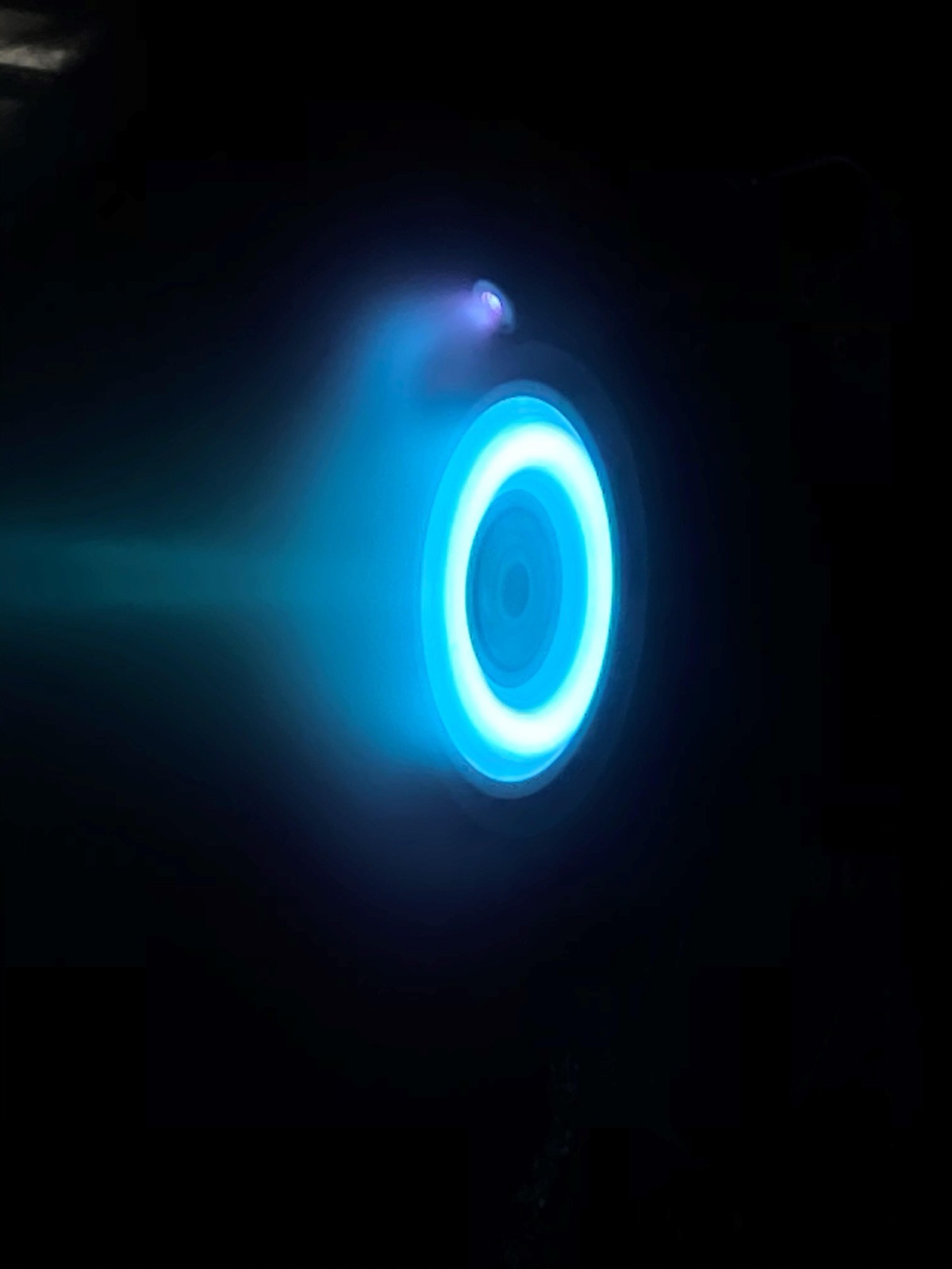 An electric Hall thruster firing